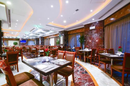 Restoranas ar kita vieta pavalgyti apgyvendinimo įstaigoje Emaar Al Mektan Hotel