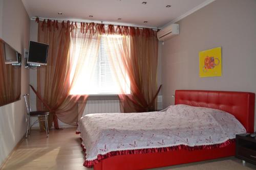 Postel nebo postele na pokoji v ubytování Apartments on Negruzzi 6/2