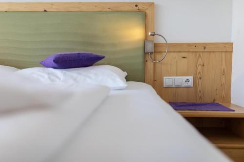 Letto o letti in una camera di Mounthotel Niggl