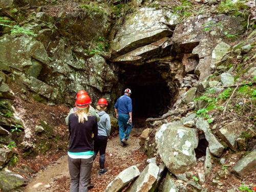 a group of people walking through a tunnel at Pension Bellevue Gondo in Ruden