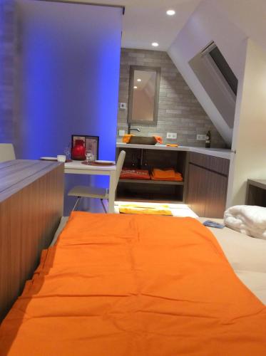 Cama o camas de una habitación en B&B wellness Sea Nat voor Naturisten