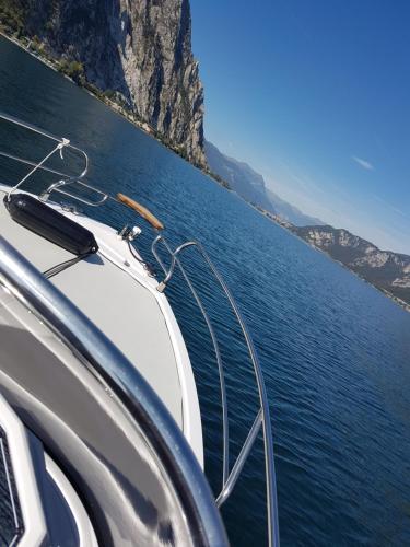 a boat on a body of water at Amata Valgre Affittacamere, comfort e pulizia eccezionali!! in Olginate