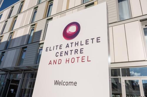 a sign in front of a building at Elite Athlete Centre and Hotel in Loughborough