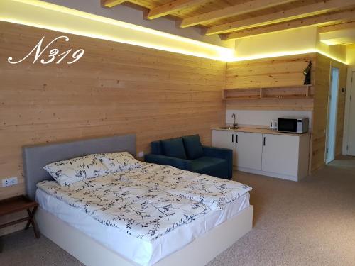 Llit o llits en una habitació de New Gudauri Suites