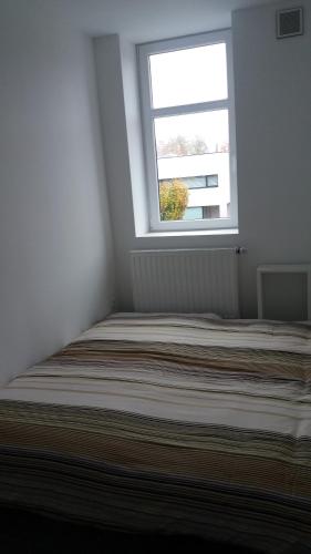 Una cama o camas en una habitación de Nieuw 2 Slaapkamer Appartement van 90 m²
