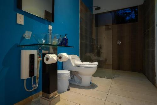 Koupelna v ubytování Hotel Quelitales