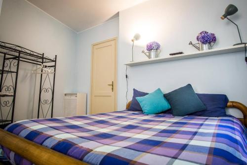 En eller flere senge i et værelse på Casa Dolce Vita