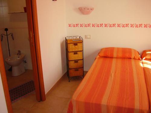 Ένα ή περισσότερα κρεβάτια σε δωμάτιο στο Agriturismo Cuile de Molino