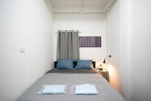 Postelja oz. postelje v sobi nastanitve Dhub Hostel Donmueng