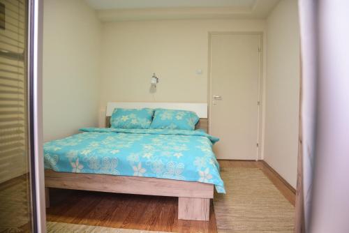 En eller flere senge i et værelse på Allegro dream