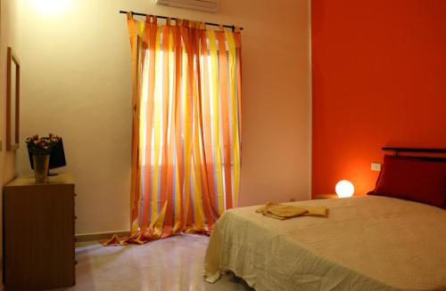Una cama o camas en una habitación de B&B La Terrazza Sul Porto