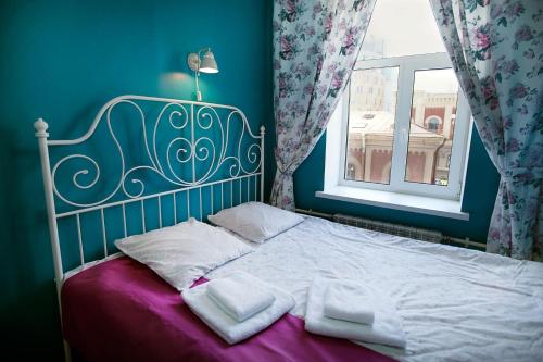 Cama ou camas em um quarto em Friends on Vosstaniya