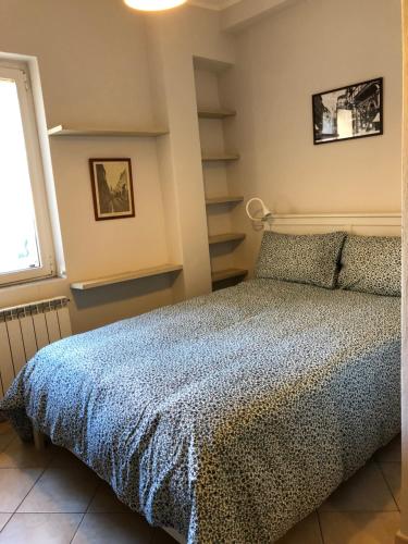 Ліжко або ліжка в номері Peppermint House - Carozzi Apartments