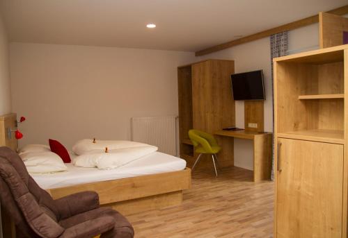 Cama o camas de una habitación en Landgasthof Wöhrer