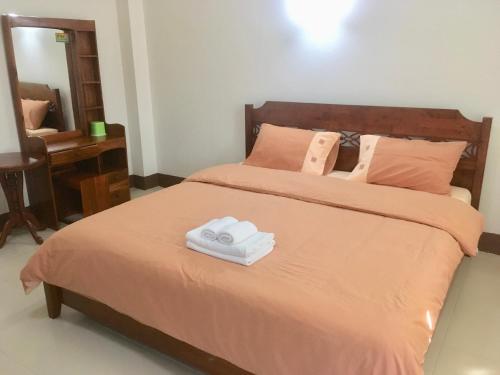 Postel nebo postele na pokoji v ubytování Phumchanplace