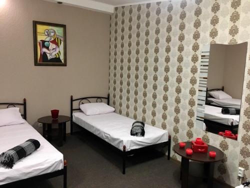 Postel nebo postele na pokoji v ubytování hostel Koleso