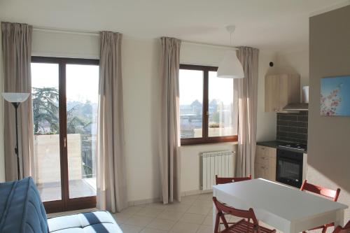 Kuchyň nebo kuchyňský kout v ubytování Case Così Apartments - Verona