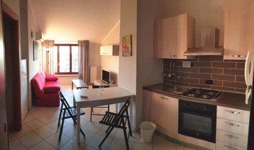 Kuchyň nebo kuchyňský kout v ubytování Case Così Apartments - Verona