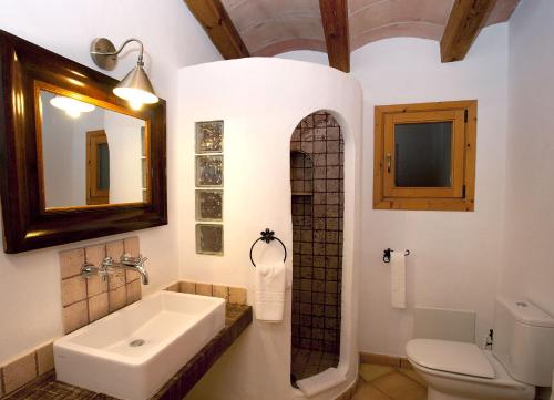 A bathroom at Villa Can Eli by SunVillas Mallorca
