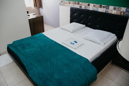Krevet ili kreveti u jedinici u okviru objekta Hotel Positano