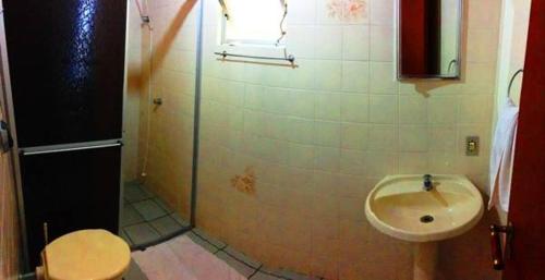 Ett badrum på Residencial Baia Blanca
