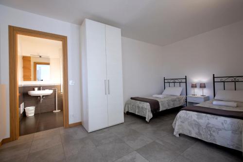 Postel nebo postele na pokoji v ubytování Agriturismo Mestroni