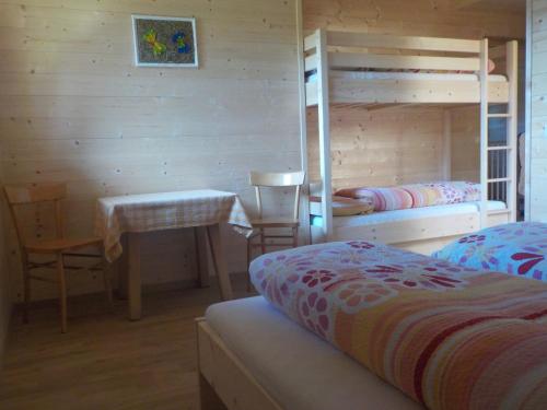 Кровать или кровати в номере Berghütte Plafötschalm