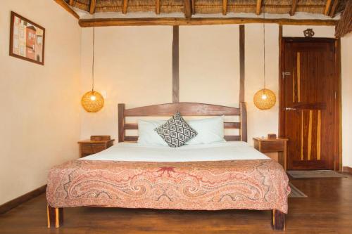 En eller flere senger på et rom på Exclusive Palafito @ Bacalar Lagoon Front