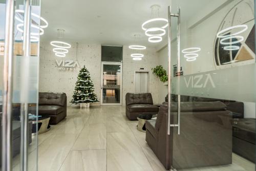 Χώρος καθιστικού στο Hotel Viza