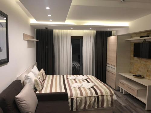 Cama ou camas em um quarto em Milmari Resort