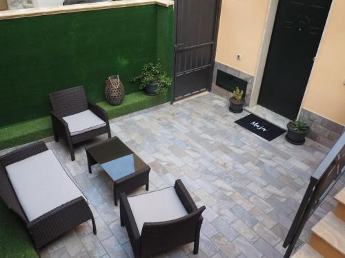 an overhead view of a patio with chairs and tables at MaJa in Reggio Calabria