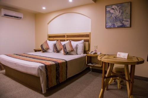 Кровать или кровати в номере La Villa de Zaragoza