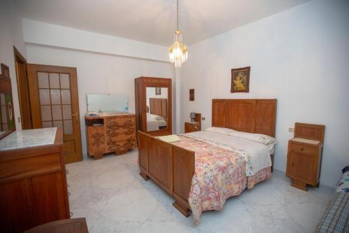 Posteľ alebo postele v izbe v ubytovaní Rosa di Calabria