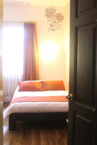 Postel nebo postele na pokoji v ubytování Hotel Andino
