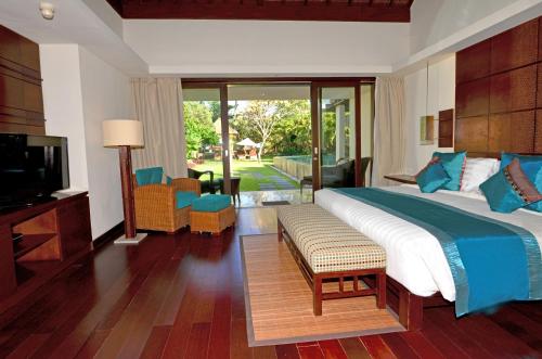 Un ou plusieurs lits dans un hébergement de l'établissement Prama Sanur Beach Bali