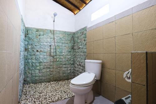Vonios kambarys apgyvendinimo įstaigoje Mega Cottages