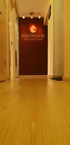 an empty room with a k turnover activation sign on a wall at Khongor Guest house & Tours in Ulaanbaatar