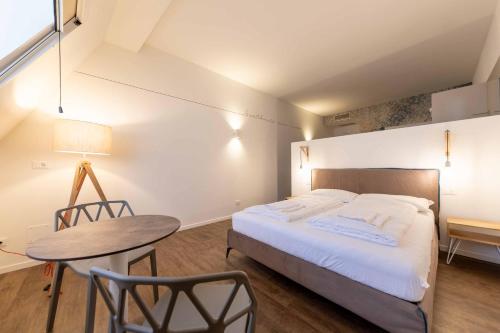Katil atau katil-katil dalam bilik di Stay COOPER l Guesthouse zum Löwen