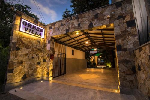 a building with a sign that reads cyber villa at Green Villa Unawatuna in Unawatuna