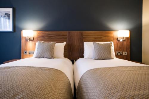 a hotel room with two beds and two pillows at Toby Carvery Birmingham by Innkeeper's Collection in Birmingham