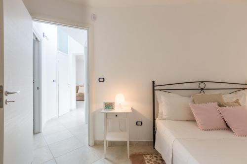 Katil atau katil-katil dalam bilik di Casa Bianca in Salento