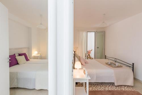 Katil atau katil-katil dalam bilik di Casa Bianca in Salento