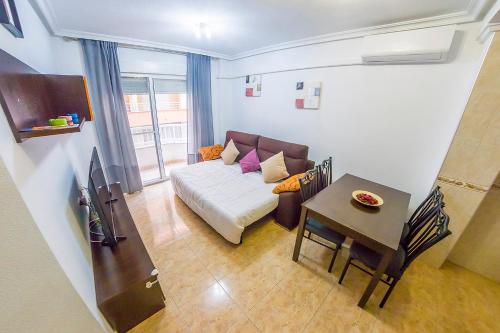 Ένα ή περισσότερα κρεβάτια σε δωμάτιο στο Homely Apartments Noruega