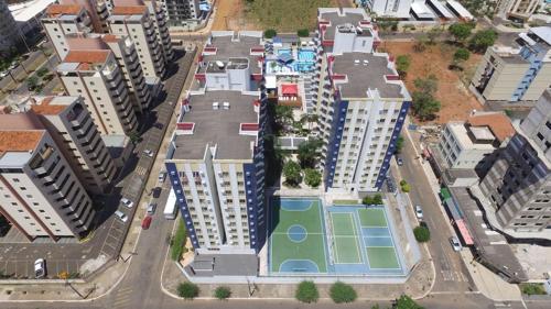 an overhead view of a city with a tennis court at Eldorado Park Caldas Novas in Caldas Novas