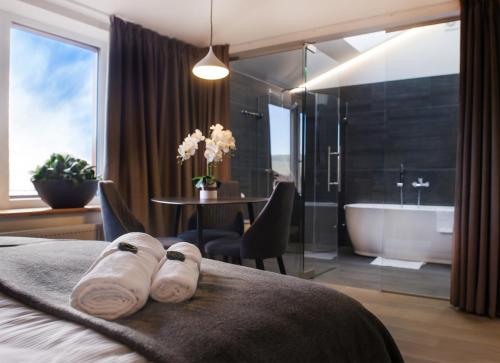 Koupelna v ubytování Dangė Hotel