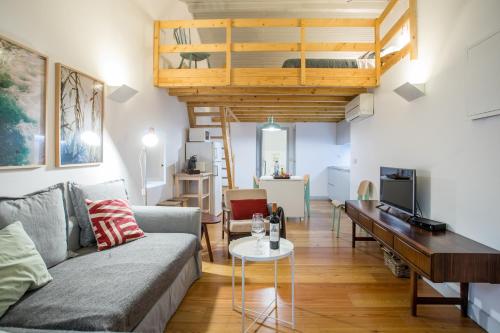 a living room with a couch and a loft at Apartments Center Bairro Alto in Lisbon