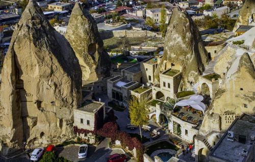 an aerial view of a city with mountains at Anatolian Houses Cave Hotel & SPA in Goreme