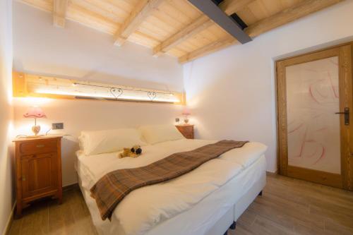 Postel nebo postele na pokoji v ubytování Maison Julie-lungo la via Francigena