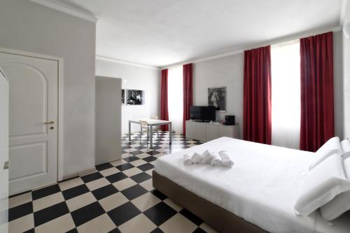 Postel nebo postele na pokoji v ubytování Cascina Marchesa