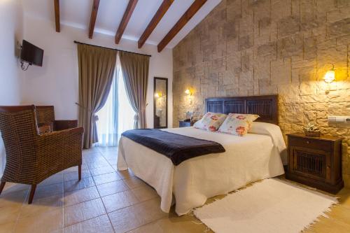 Ένα ή περισσότερα κρεβάτια σε δωμάτιο στο Hotel Tossal d'Altea